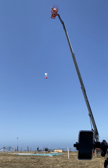 Launching a new parachute design from 80 ft up.